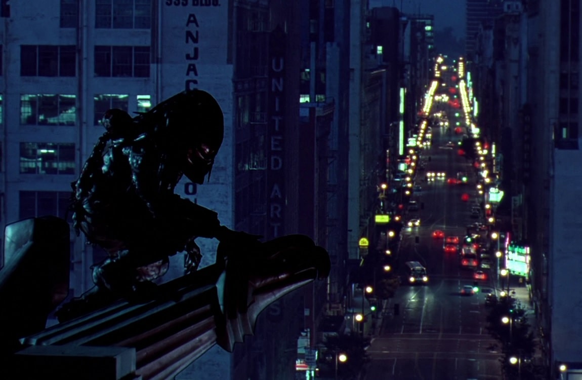 The City Hunter observes LA from a rooftop