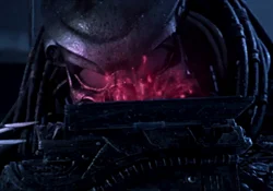 Celtic Predator studying a holographic map of the Antarctic temple in Alien vs. Predator